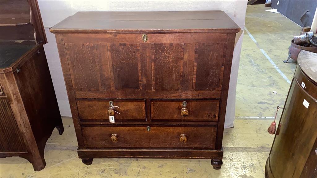 A George III mahogany banded oak mule chest, width 105cm, depth 47cm, height 105cm